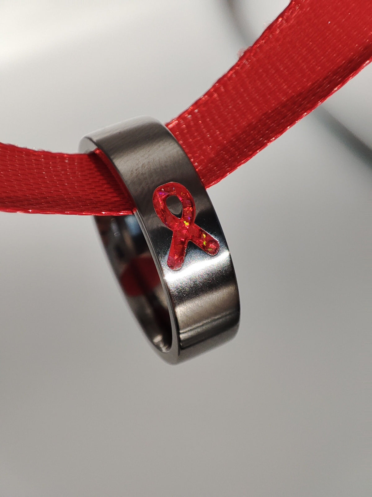Resolve - Red Awareness Ribbon - Titanium